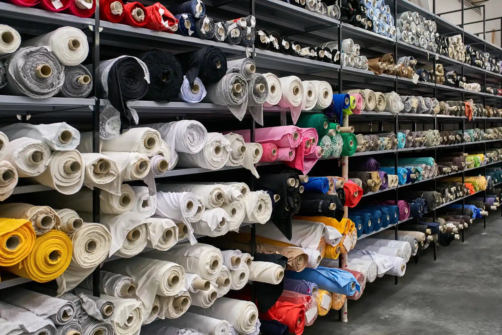 The Fabric Graveyard: Our Commitment to Sourcing Surplus Stock for Zero-Waste Apparel